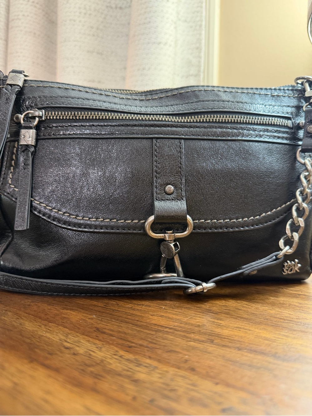 The Sak Black Leather Crossbody with Chain Accent